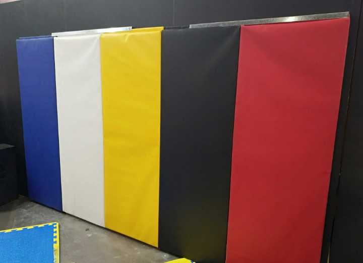 CUSTOM WOOD BACKED GYM WALL PADDING PANELS 2' X 6'