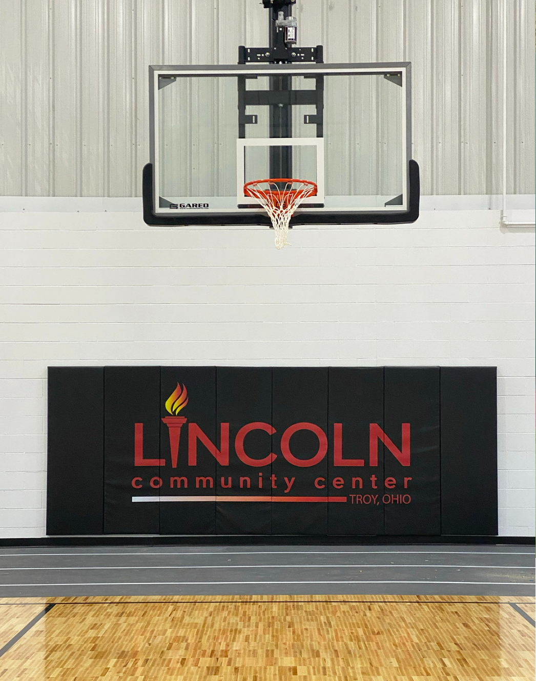 CUSTOM WOOD BACKED GYM WALL PADDING PANELS 2' X 8'