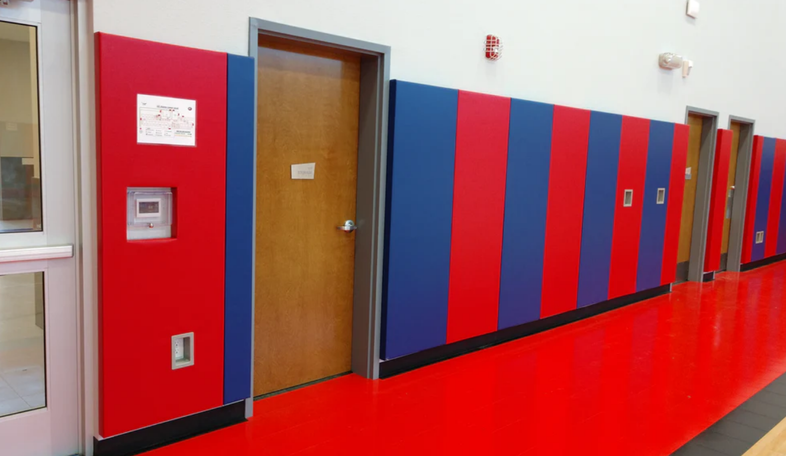 CUSTOM WOOD BACKED GYM WALL PADDING PANELS 2' X 6'
