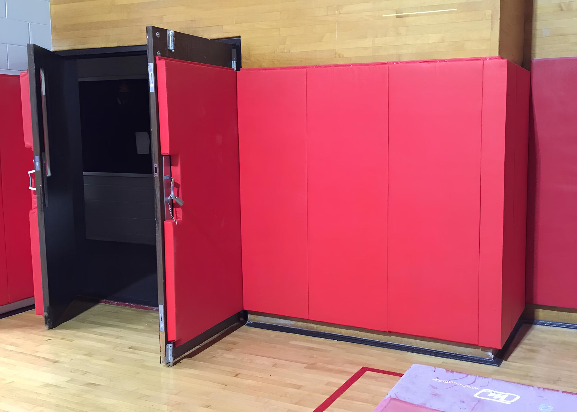 CUSTOM WOOD BACKED GYM WALL PADDING PANELS 2' X 6'